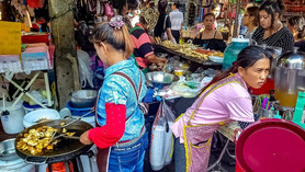 [Translate to English:] Starßenküche in Bangkok